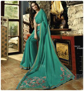 Turquoise embroidered georgette saree with blouse 3