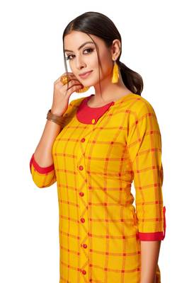 Yellow printed rayon kurtas-and-kurtis 4