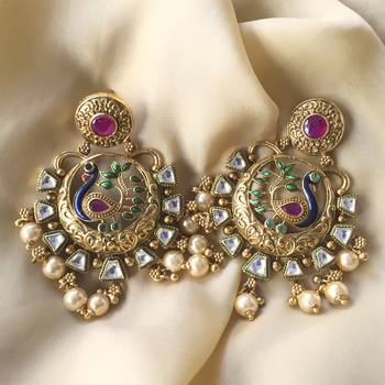 Gold earrings 1