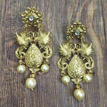 Gold earrings 3