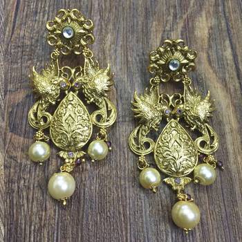 Gold earrings 4