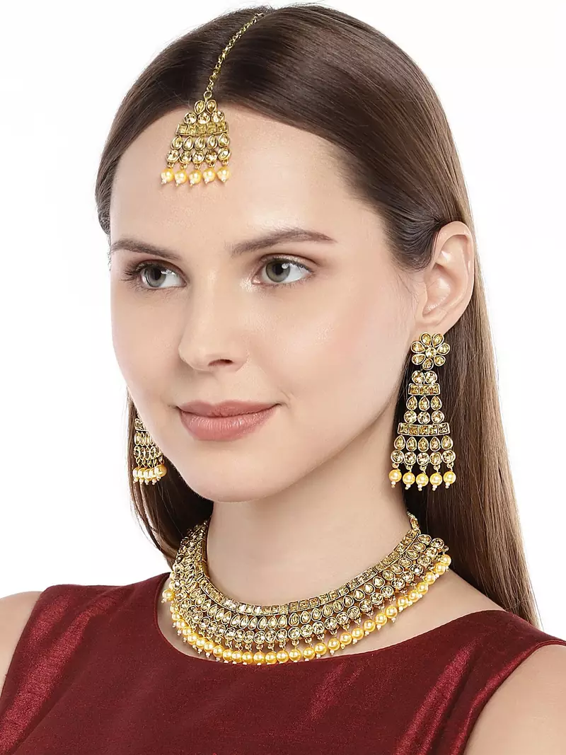 Traditional Gold Plated Handcrafted Stone Studded & Pearl Necklace Set With Earrings & Maang Tikka For Women