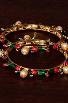 Copper Made Ruby, Pearl and Meenakari Worked Peacock Styled Pair of Designer Bangles BD361