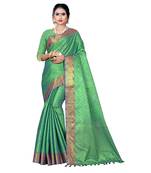 Green woven banarasi silk saree with blouse