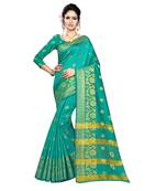 Green woven silk blend saree with blouse
