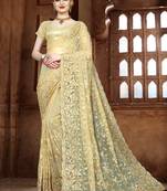Beige Embroidered Net Saree With Blouse