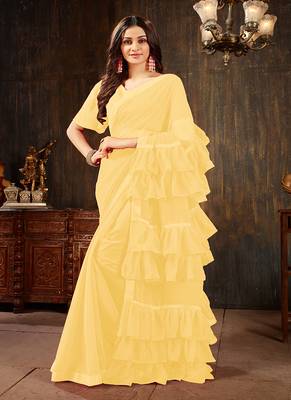 Yellow plain georgette ruffle saree with blouse 1