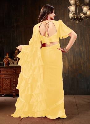 Yellow plain georgette ruffle saree with blouse 3