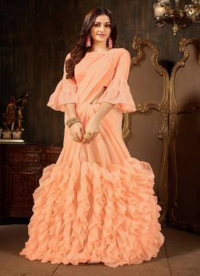 Peach plain georgette ruffle saree with blouse 1