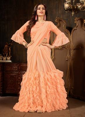 Peach plain georgette ruffle saree with blouse 2