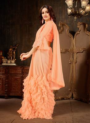 Peach plain georgette ruffle saree with blouse 3