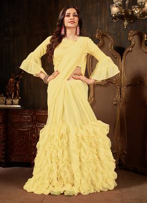Yellow plain georgette ruffle saree with blouse 1