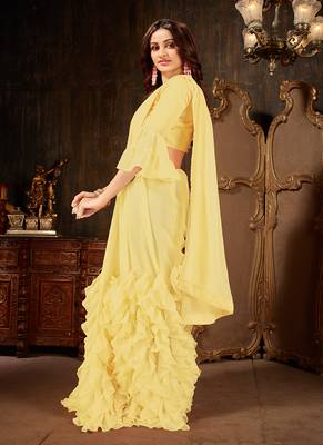Yellow plain georgette ruffle saree with blouse 2