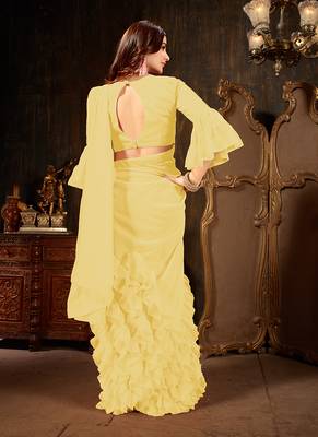 Yellow plain georgette ruffle saree with blouse 3