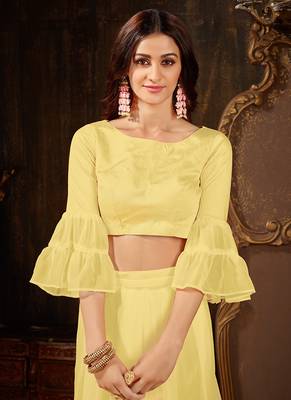 Yellow plain georgette ruffle saree with blouse 4