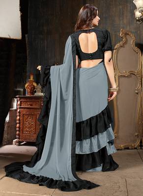 Grey plain georgette ruffle saree with blouse 3