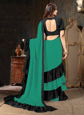 Green plain georgette ruffle saree with blouse 3