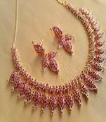 Uncut ruby necklace with earrings