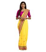 Dark yellow embroidered georgette saree with blouse