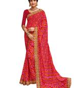 Pink embroidered georgette saree with blouse