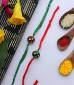 Red Green Handcrafted Kundan Inspired Meenakari Rakhis (Set Of 2)
