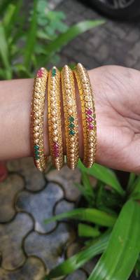 Gold Plated And Multicolour Beaded Bangles Set Of 4 5