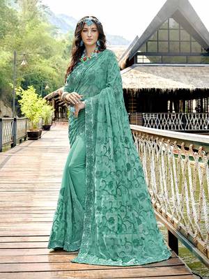 Sea green embroidered georgette saree with blouse 1