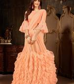 Peach embroidered georgette saree with blouse