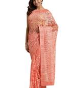 Orange embroidered net saree with blouse