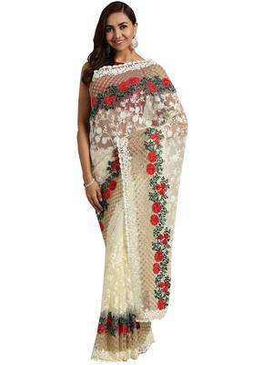Cream embroidered net saree with blouse 1