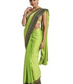 Green embroidered poly silk saree with blouse