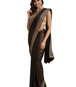 Brown embroidered faux georgette saree with blouse