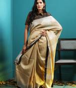 Biscotti Yellow Linen Saree With Zari Border