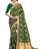 Green woven banarasi silk saree with blouse