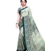 Turquoise printed crepe saree with blouse