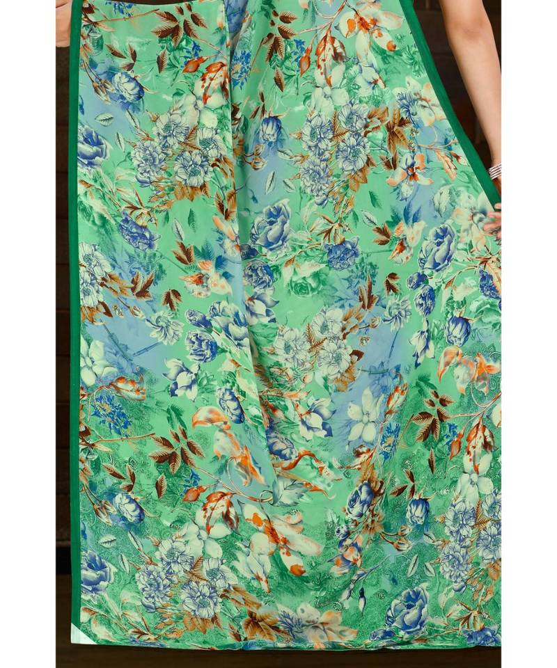 green printed georgette saree with blouse