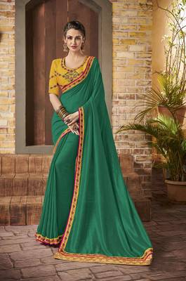 Green embroidered crepe saree with blouse 1