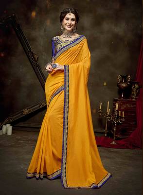 Yellow embroidered georgette saree with blouse 1