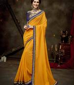 Yellow embroidered georgette saree with blouse