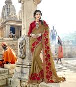 Beige embroidered georgette saree with blouse
