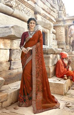 Dark orange embroidered georgette saree with blouse 1