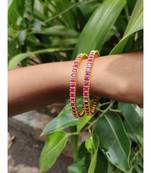 Gold Plated Pink Stone Studded Bangles Set Of 2