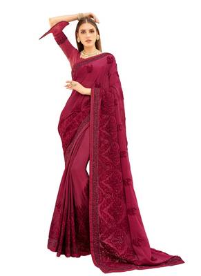 Magenta woven georgette saree with blouse 1