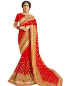 Red embroidered georgette saree with blouse