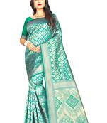 Sea green woven art silk saree with blouse