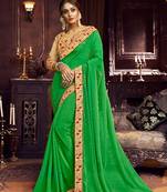 Green embroidered georgette saree with blouse