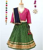 Printed Green Lehenga With Contrast Pink Tie Back Choli And Black Dupatta