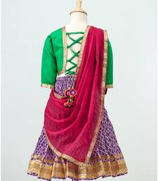 Purple printed Lehenga with contrast green tie back choli and Pink Dupatta