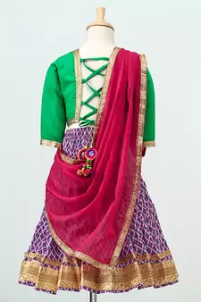 Purple printed Lehenga with contrast green tie back choli and Pink Dupatta