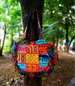 Multicolored Real Mirror Worked Banjara Bag With Hanging Pompom Tassels
